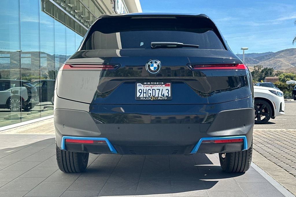 Used 2023 BMW iX xDrive50 w/ BMW I Signature Blue Package AWD/4WD image 4