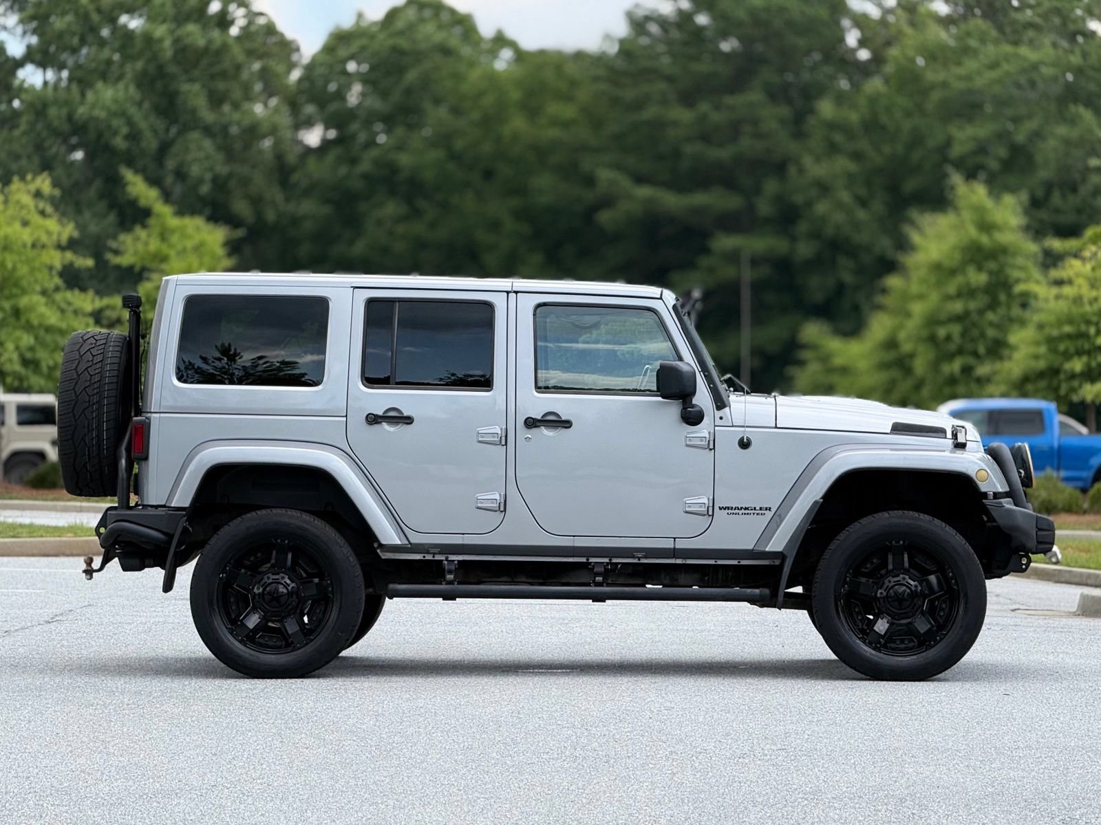 Used 2014 Jeep Wrangler Unlimited Rubicon w/ Dual Top Group AWD/4WD image 12
