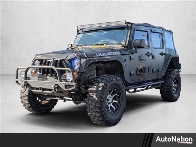 Used 2011 Jeep Wrangler Unlimited Rubicon w/ Dual Top Group