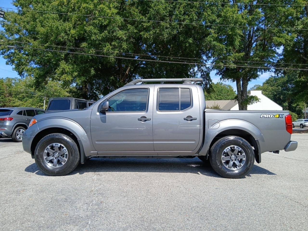 Used 2021 Nissan Frontier PRO-4X w/ Pro-4x Utility Package AWD/4WD image 1