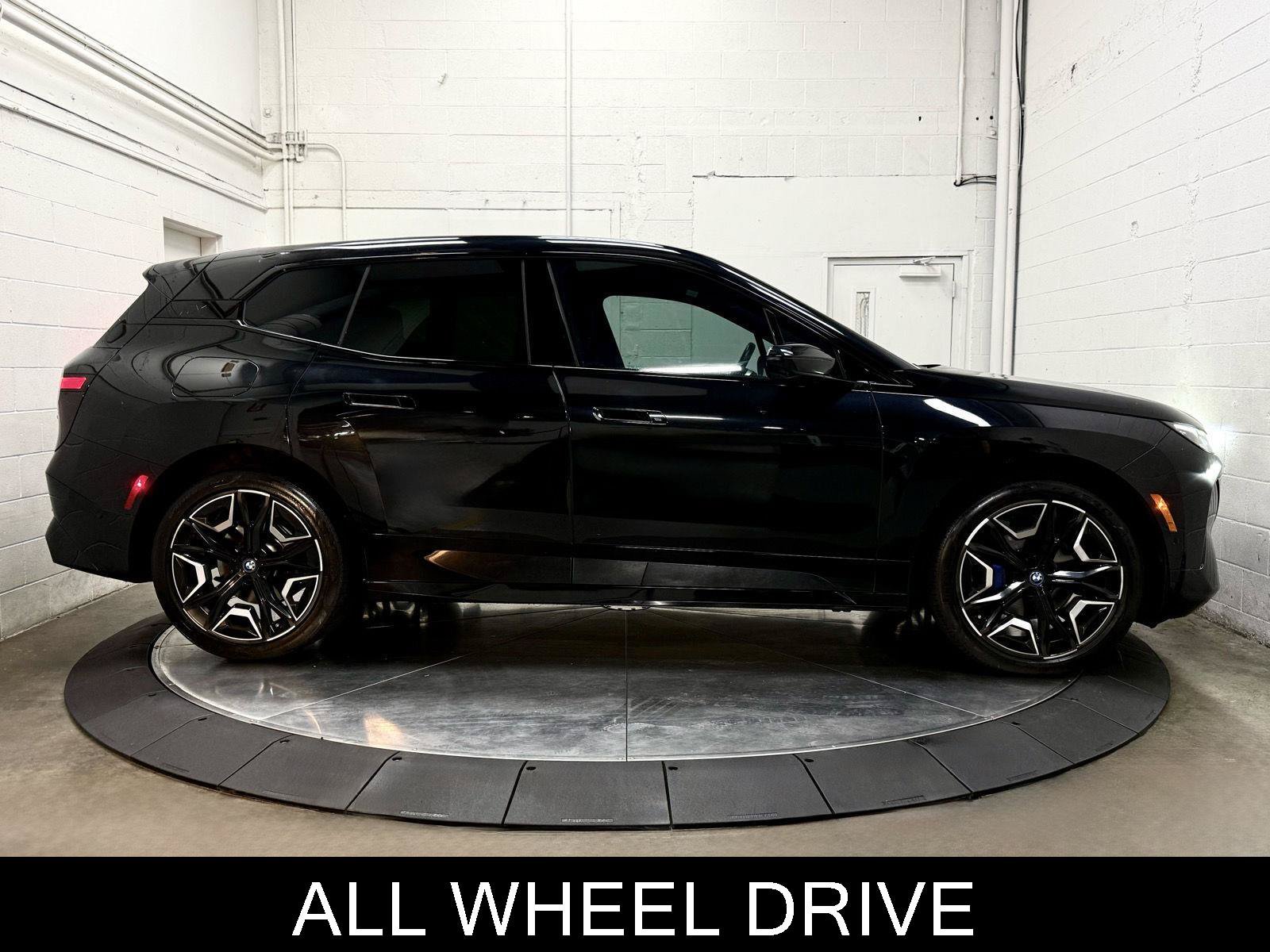 Used 2024 BMW iX xDrive50 w/ Sport Package AWD/4WD image 11