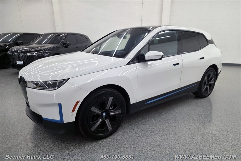 Used 2024 BMW iX xDrive50 w/ BMW I Signature Blue Package AWD/4WD image 4