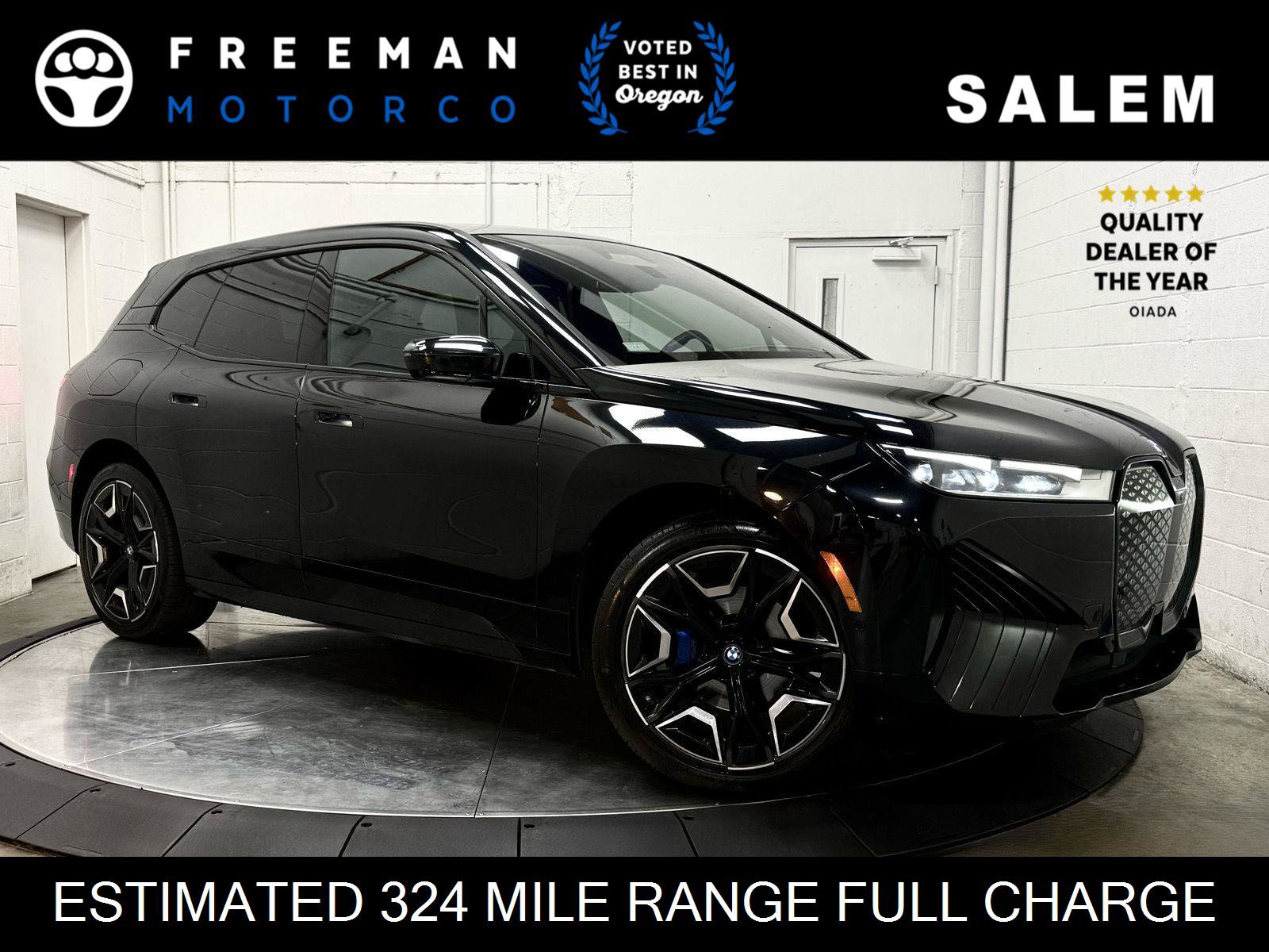 Used 2024 BMW iX xDrive50 w/ Sport Package AWD/4WD image 1