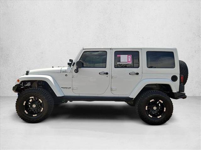 Used 2013 Jeep Wrangler Unlimited Sahara AWD/4WD image 9