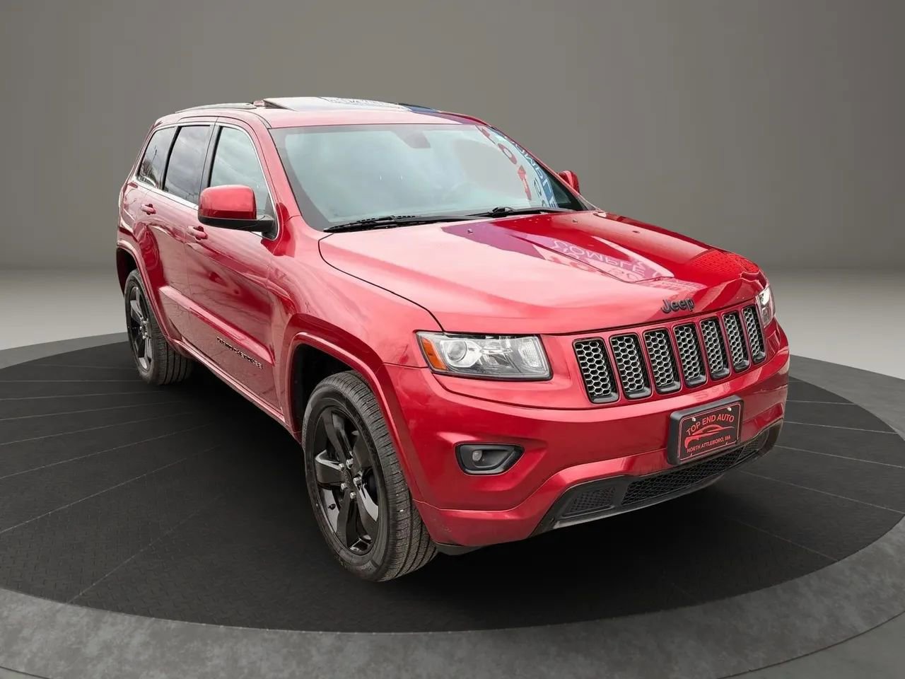 Used 2014 Jeep Grand Cherokee Altitude AWD/4WD image 3