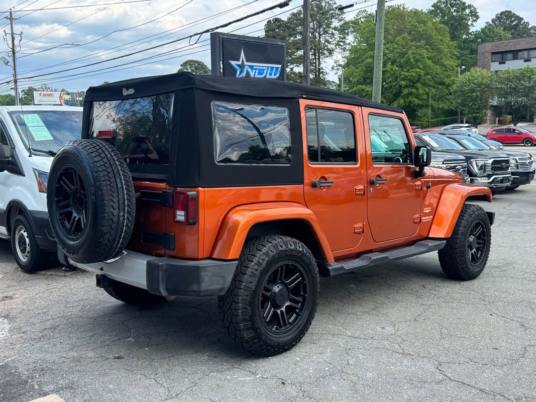 Used 2010 Jeep Wrangler Unlimited Sahara w/ Dual Top Group AWD/4WD image 4