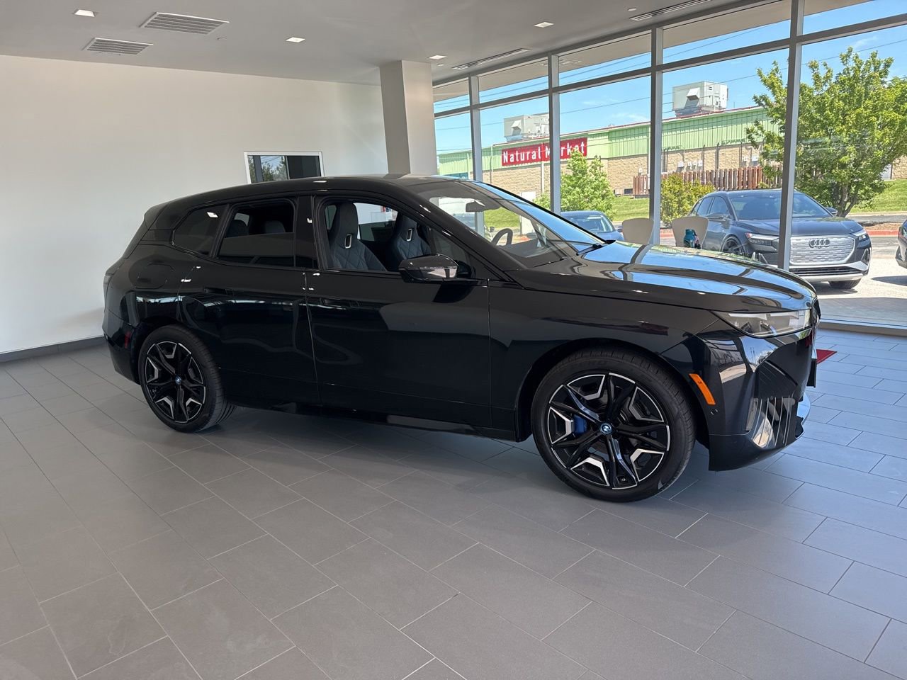 Used 2024 BMW iX xDrive50 w/ Sport Package image 1