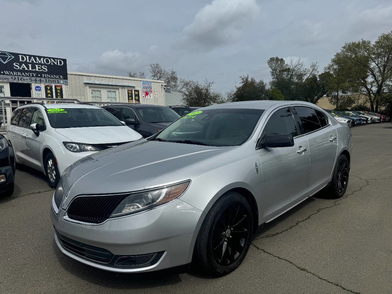 Used 2013 Lincoln MKS image 1