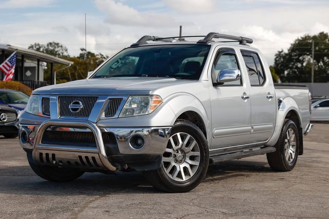 Used 2012 Nissan Frontier SL image 1