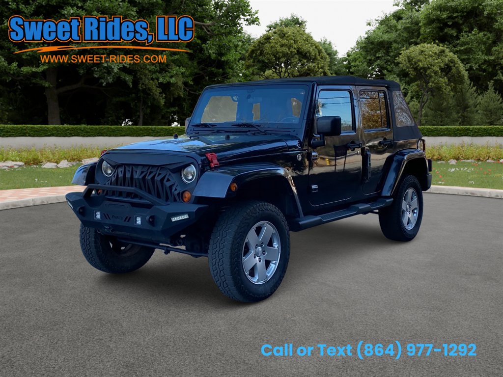 Used 2011 Jeep Wrangler Unlimited Sahara w/ Connectivity Group image 1