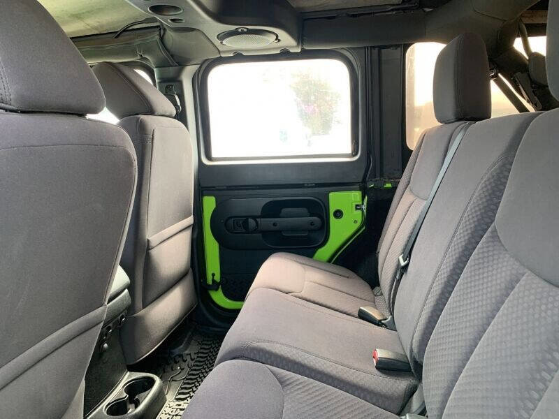 Used 2013 Jeep Wrangler Unlimited Sport w/ Mopar Black Appearance Group image 15