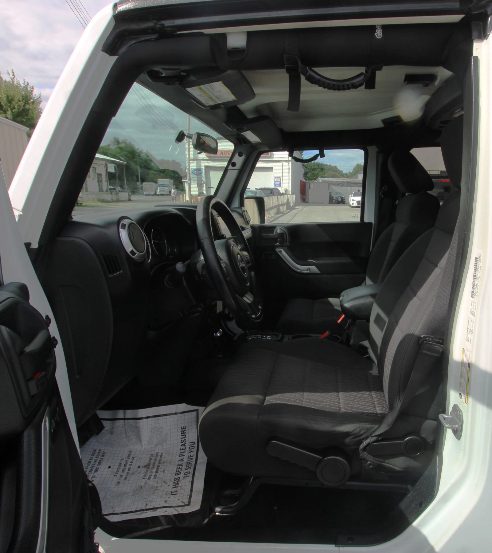 Used 2012 Jeep Wrangler Unlimited Sahara w/ Dual Top Group AWD/4WD image 9