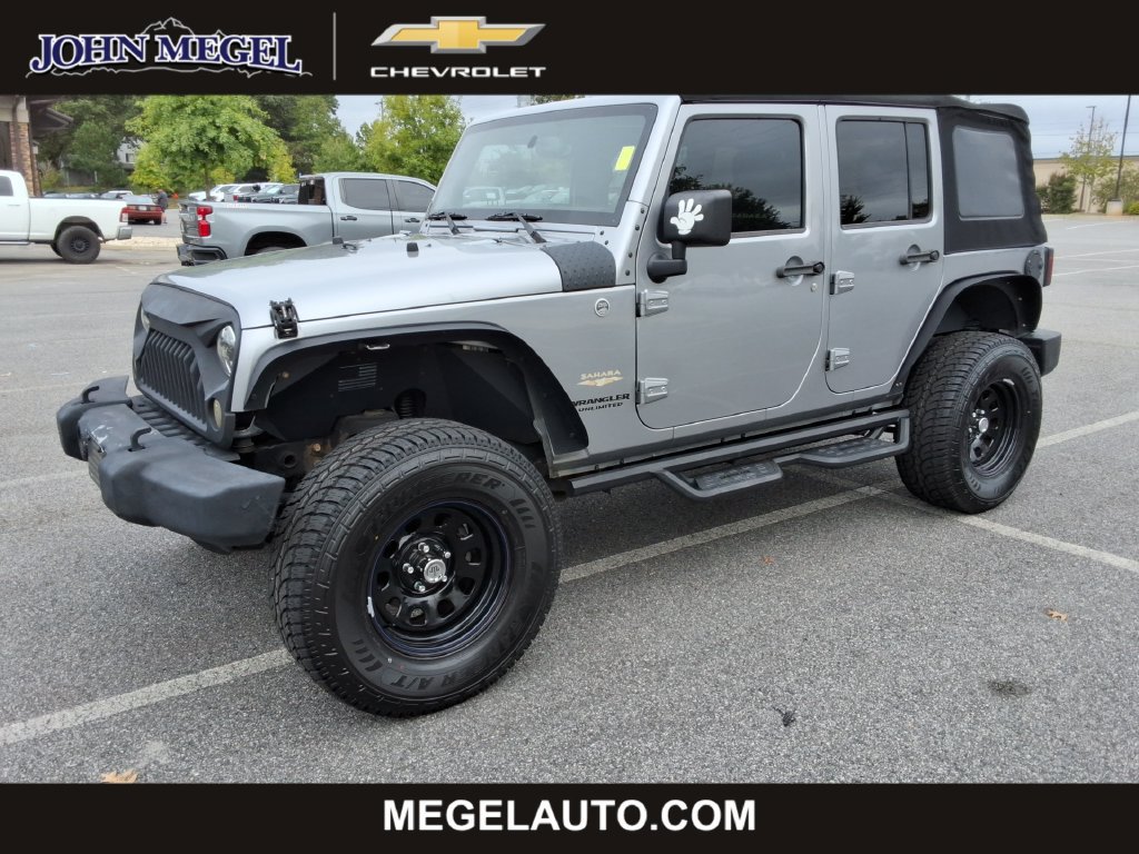 Used 2014 Jeep Wrangler Unlimited Sahara w/ Max Tow Package AWD/4WD image 1