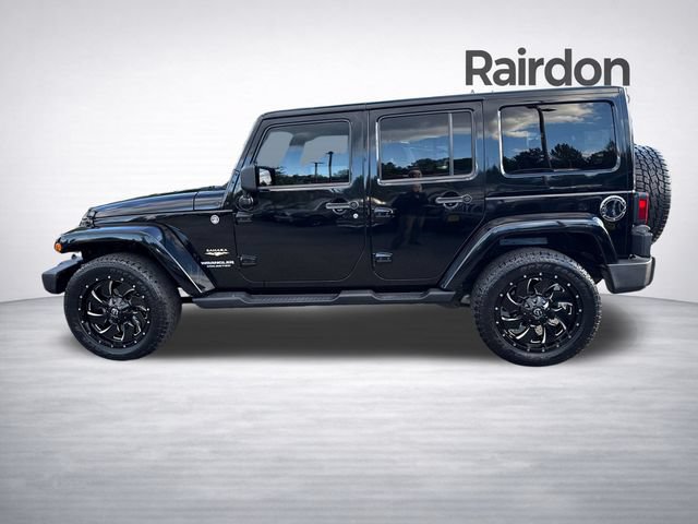 Used 2012 Jeep Wrangler Unlimited Sahara AWD/4WD image 4