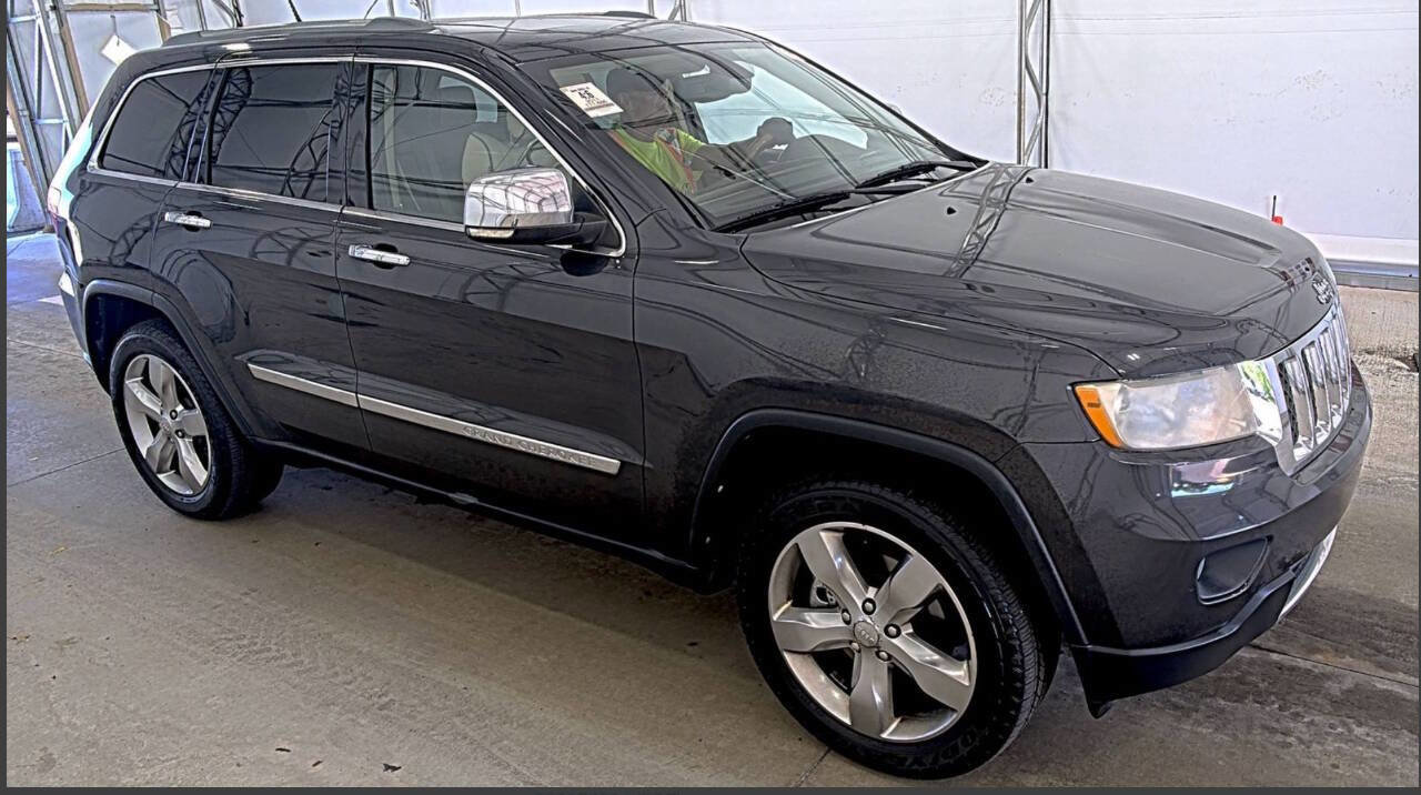 Used 2011 Jeep Grand Cherokee Overland AWD/4WD image 1