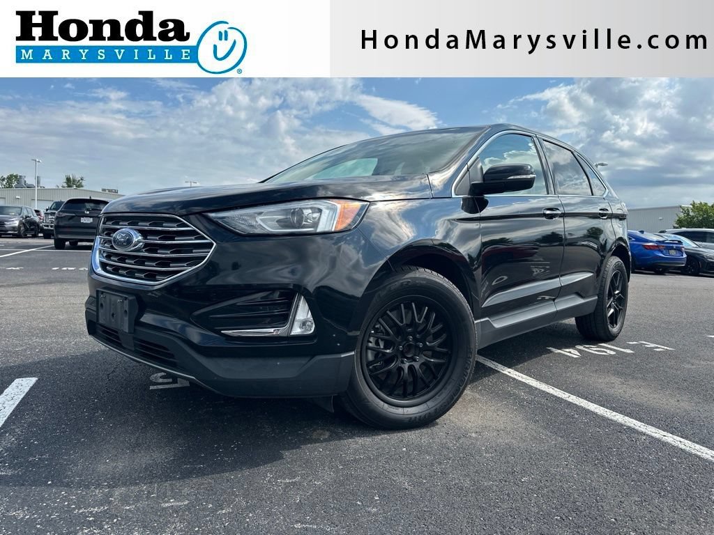 Used 2019 Ford Edge Titanium w/ Cold Weather Package AWD/4WD image 1
