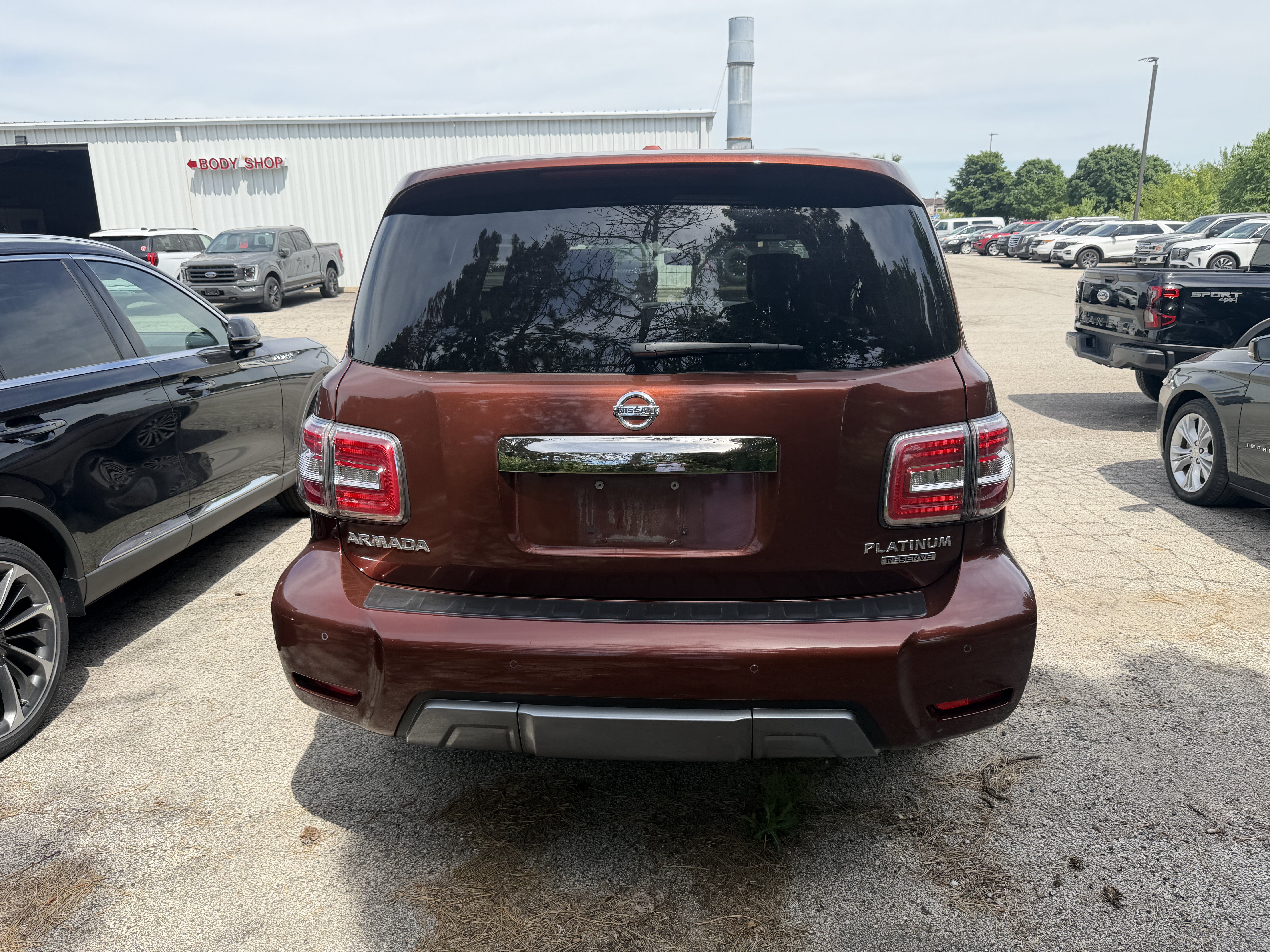 Used 2018 Nissan Armada Platinum w/ Captain Seat Package RWD image 11