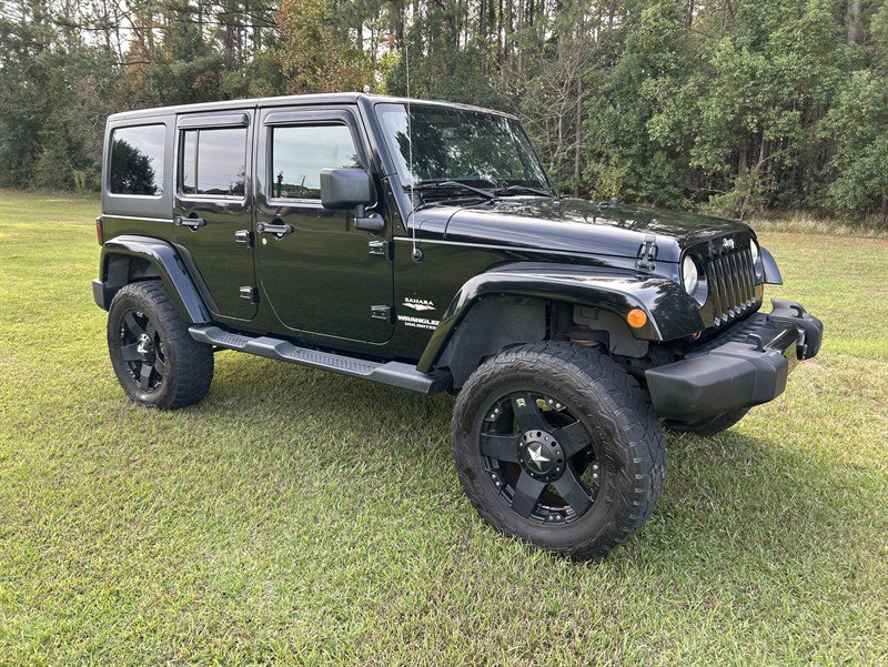 Used 2013 Jeep Wrangler Unlimited Sahara w/ Dual Top Group image 10