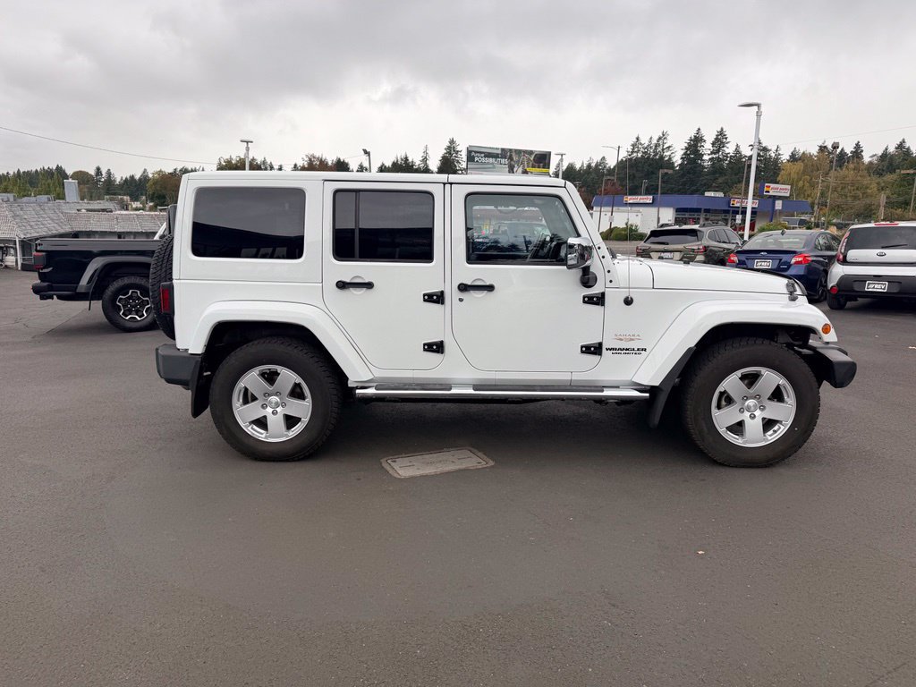 Used 2012 Jeep Wrangler Unlimited Sahara w/ Dual Top Group AWD/4WD image 6