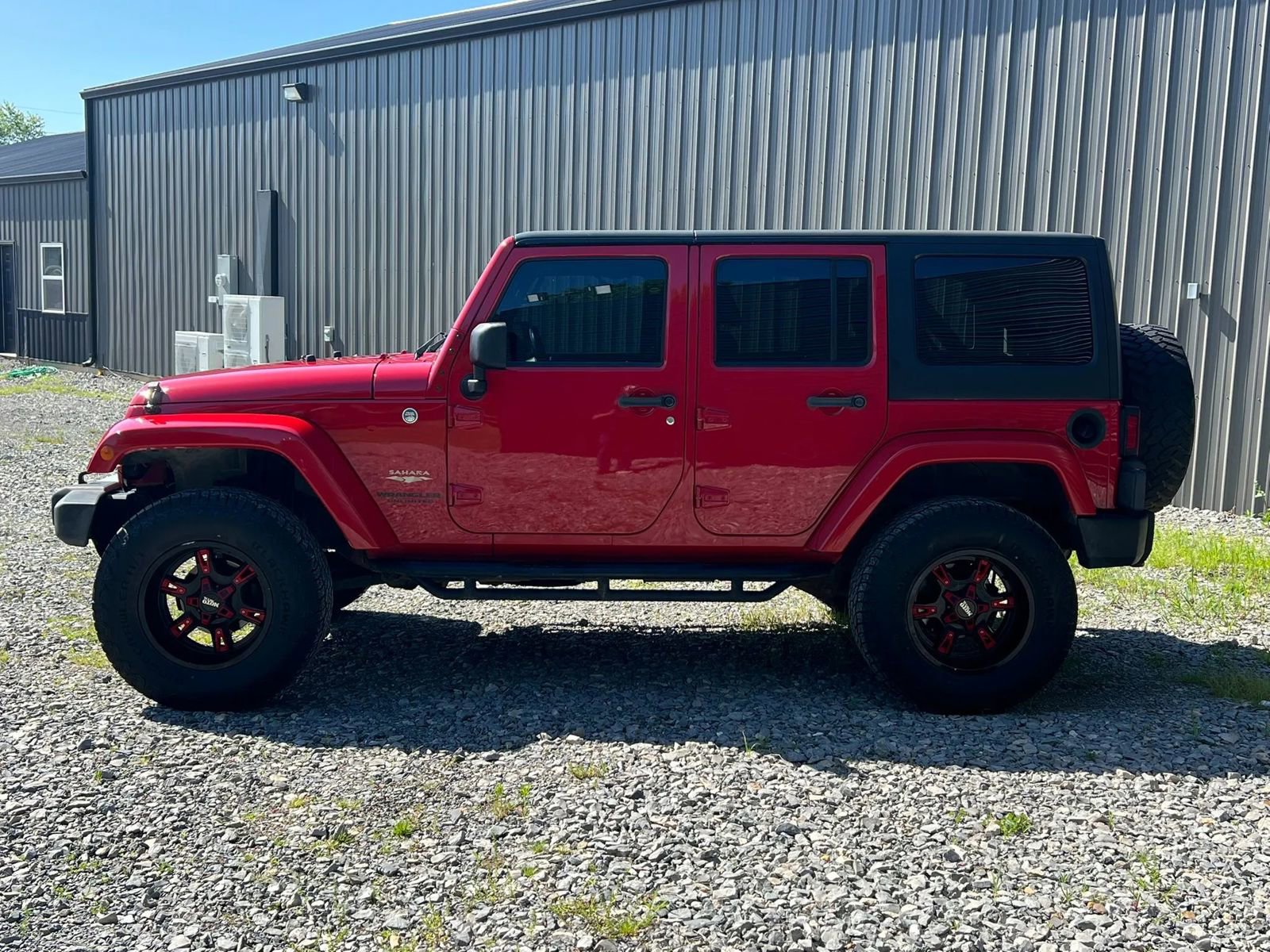 Used 2013 Jeep Wrangler Unlimited Sahara w/ Dual Top Group AWD/4WD image 2