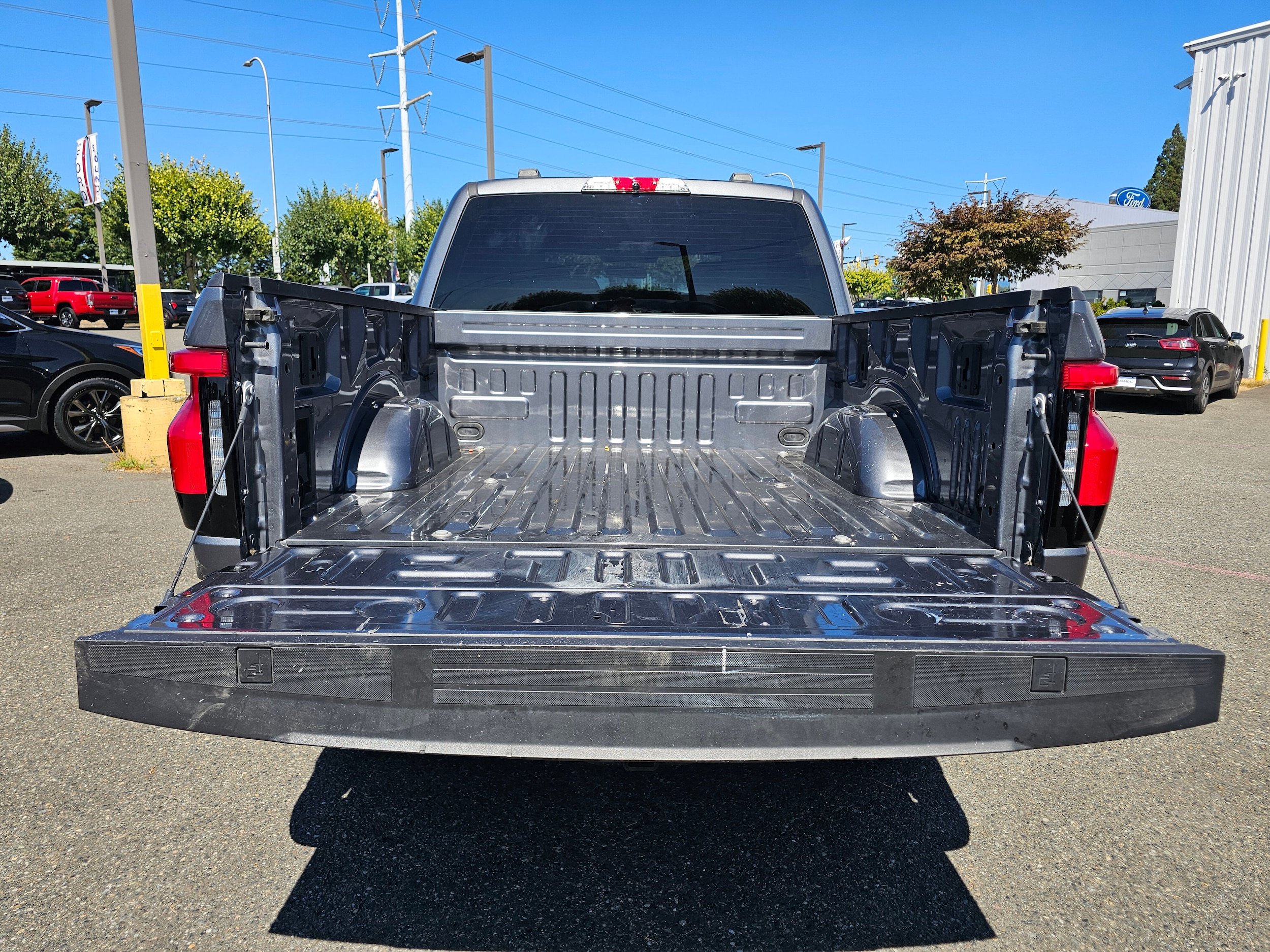 Certified 2023 Ford F150 Lightning XLT w/ Tow Technology Package AWD/4WD image 10