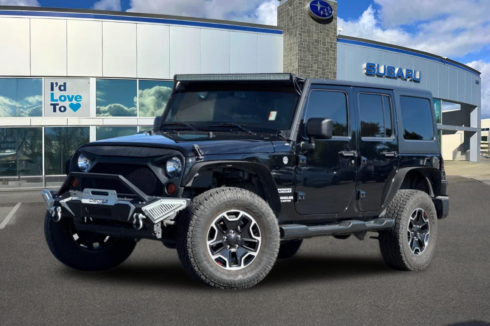 Used 2013 Jeep Wrangler Unlimited Sport AWD/4WD image 1