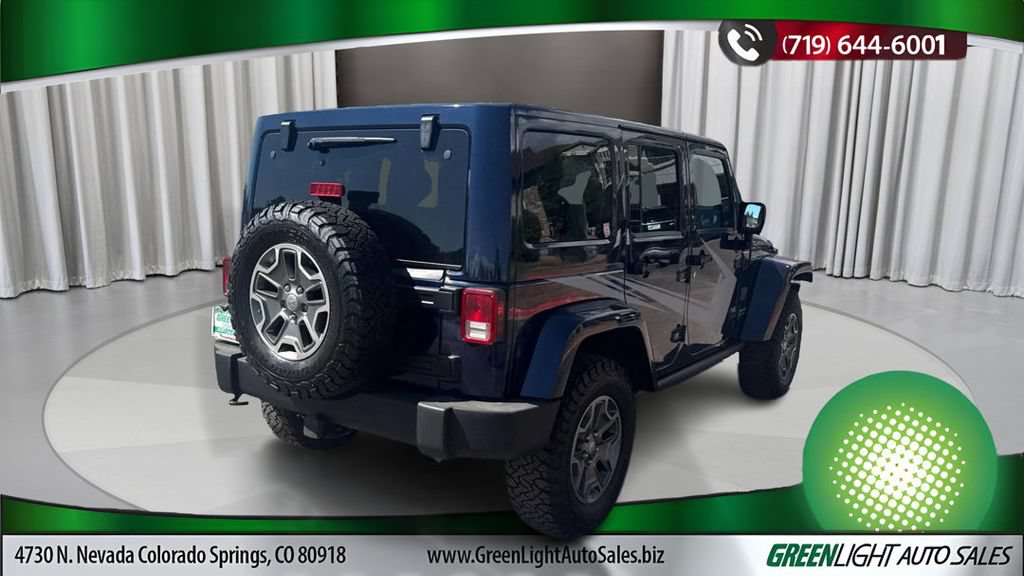 Used 2013 Jeep Wrangler Unlimited Rubicon w/ Dual Top Group AWD/4WD image 5