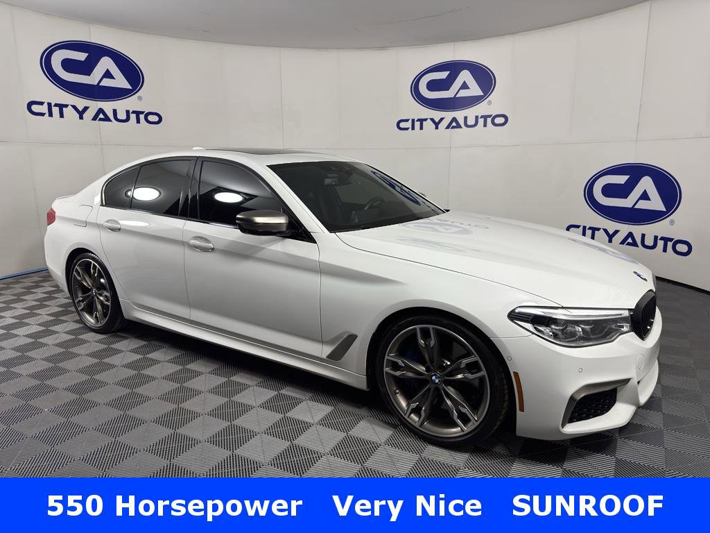 Used 2020 BMW M550i xDrive w/ Executive Package image 1