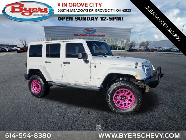 Used 2012 Jeep Wrangler Unlimited Rubicon w/ Dual Top Group image 1