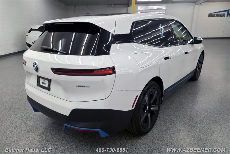 Used 2024 BMW iX xDrive50 w/ BMW I Signature Blue Package AWD/4WD image 9