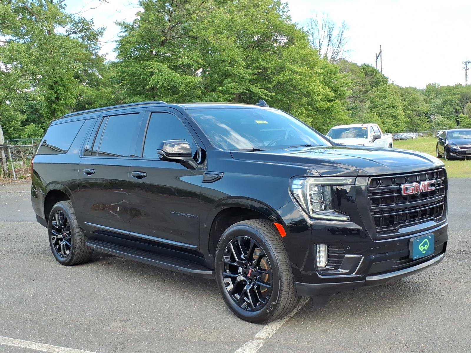 Certified 2022 GMC Yukon XL SLT w/ SLT Premium Package AWD/4WD image 1