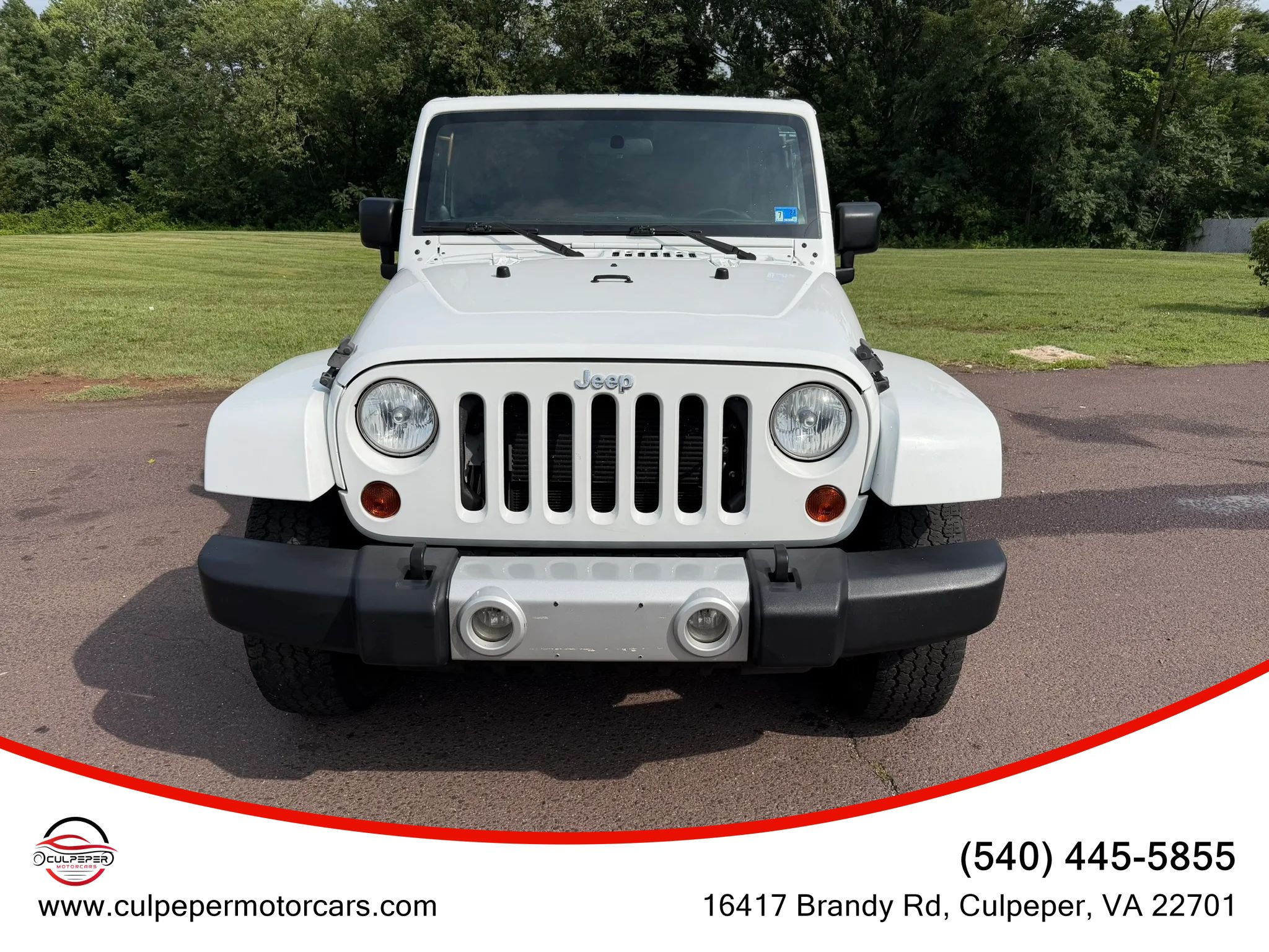 Used 2012 Jeep Wrangler Unlimited Sahara w/ Connectivity Group AWD/4WD image 1