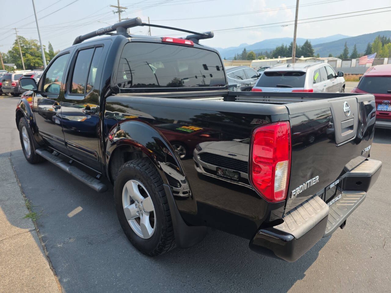 Used 2006 Nissan Frontier LE w/ (X01) Leather Pkg AWD/4WD image 5