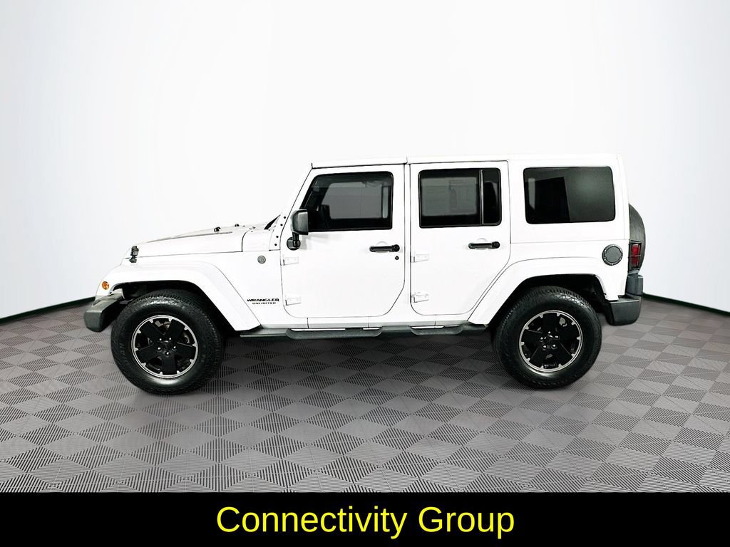 Used 2012 Jeep Wrangler Unlimited Sahara AWD/4WD image 6