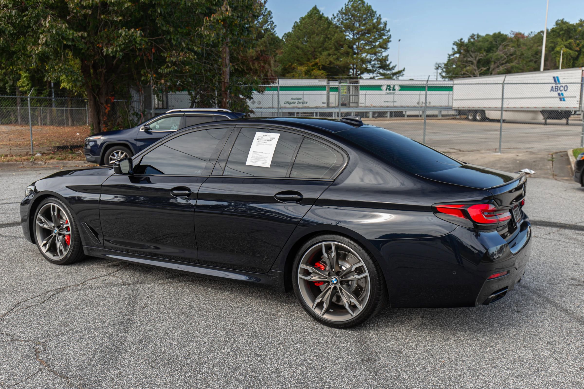 Used 2022 BMW M550i xDrive w/ Shadowloine Package image 18