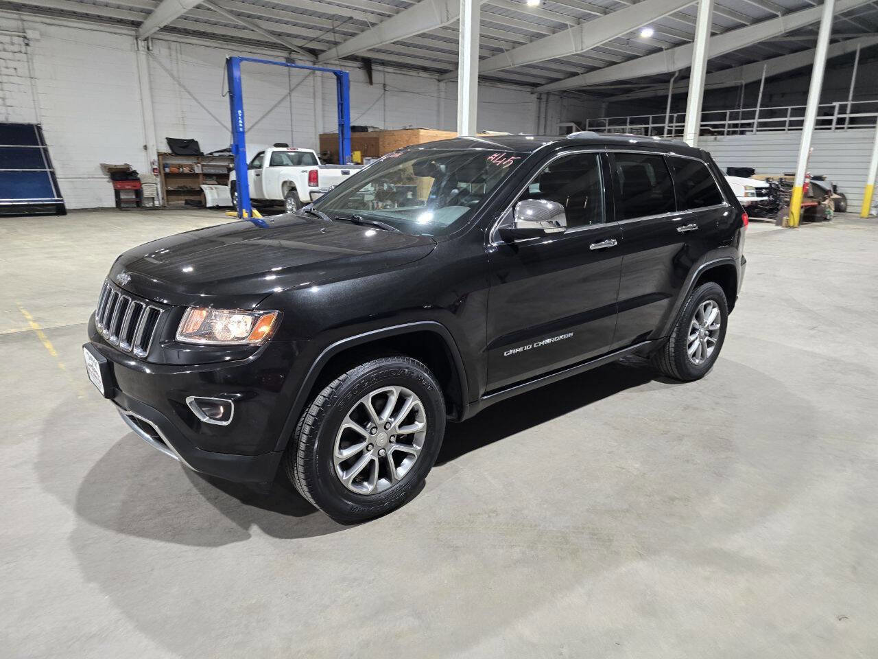 Used 2014 Jeep Grand Cherokee Limited AWD/4WD image 1