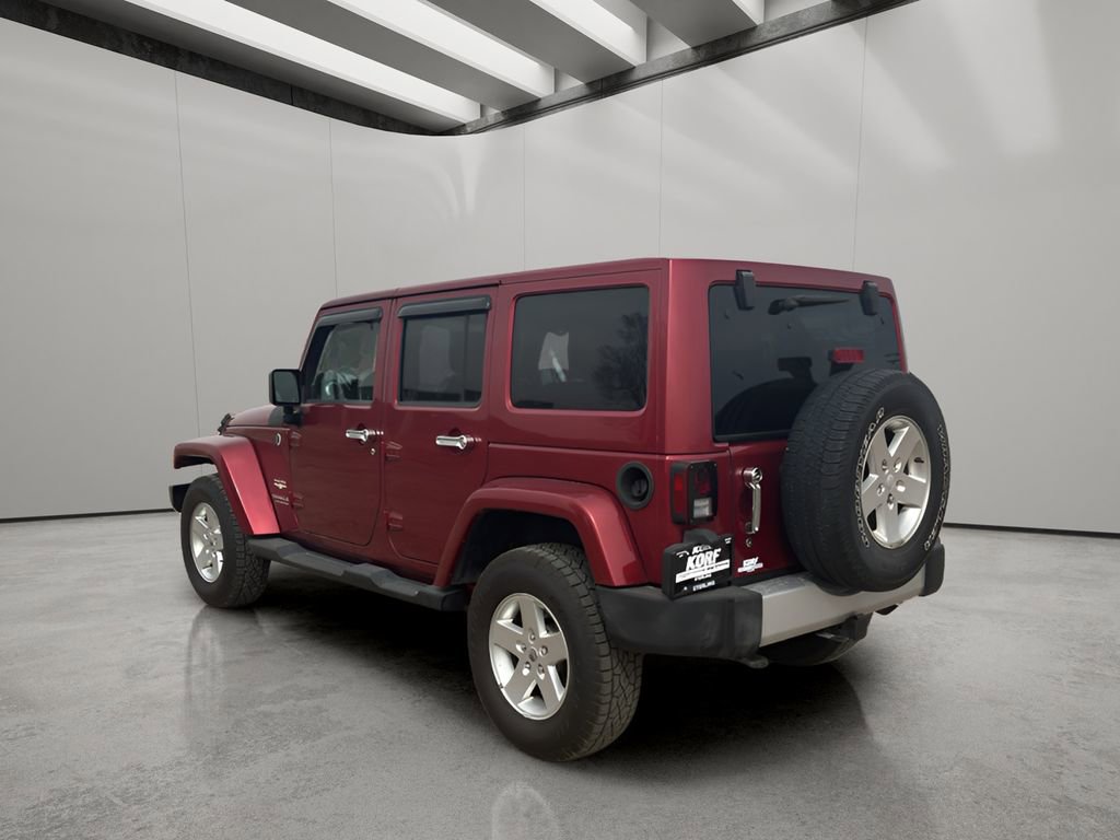 Used 2012 Jeep Wrangler Unlimited Sahara w/ Dual Top Group image 8