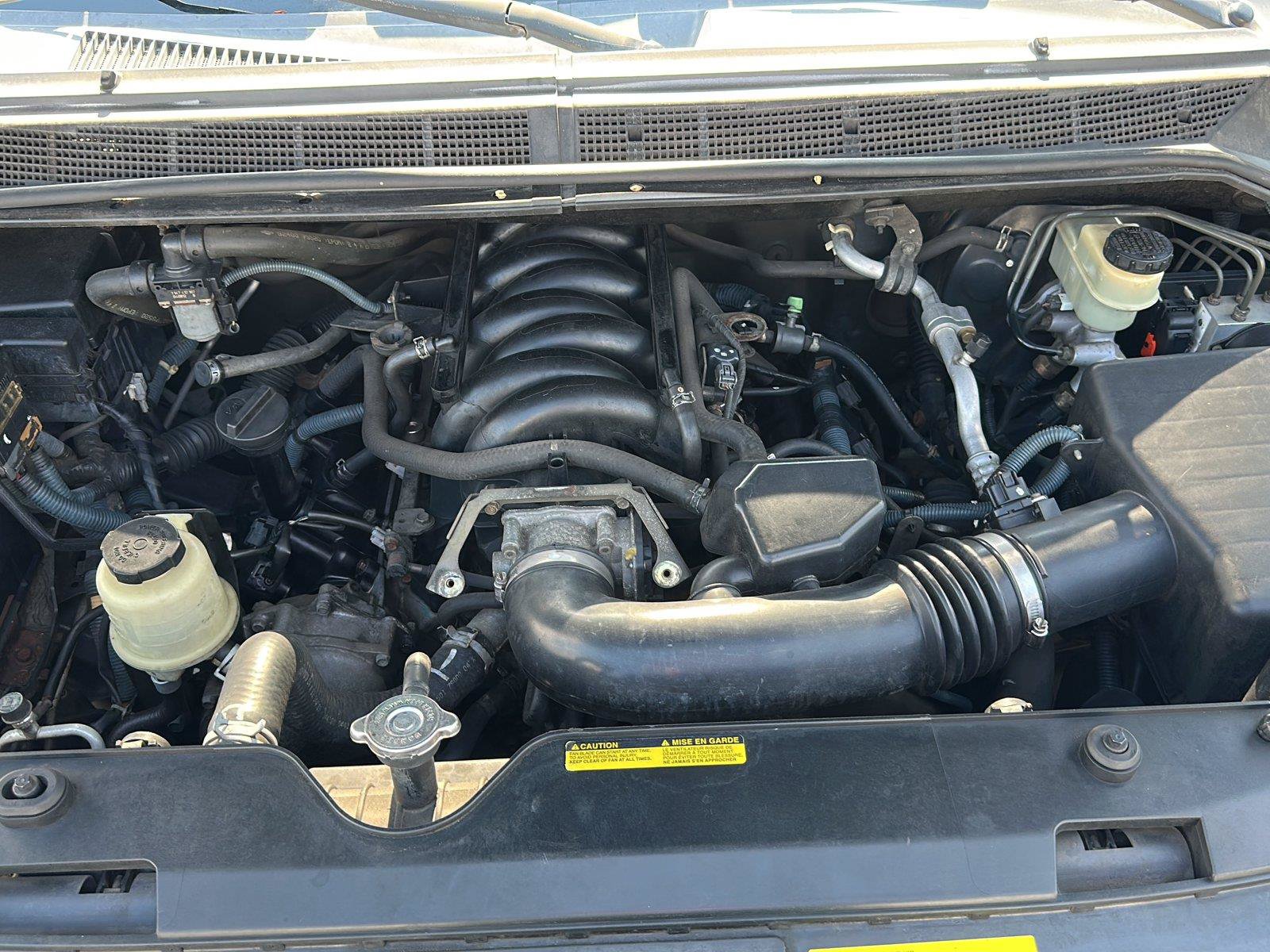 Used 2005 Nissan Titan SE w/ (W01) Utility Bed Pkg AWD/4WD image 29