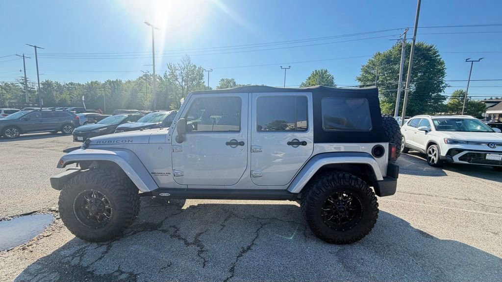 Used 2014 Jeep Wrangler Unlimited Rubicon w/ Dual Top Group AWD/4WD image 12
