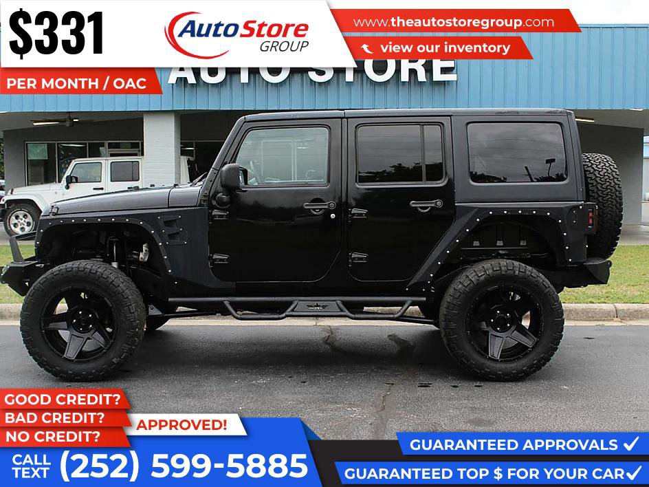 Used 2012 Jeep Wrangler Unlimited Rubicon w/ Connectivity Group AWD/4WD image 1