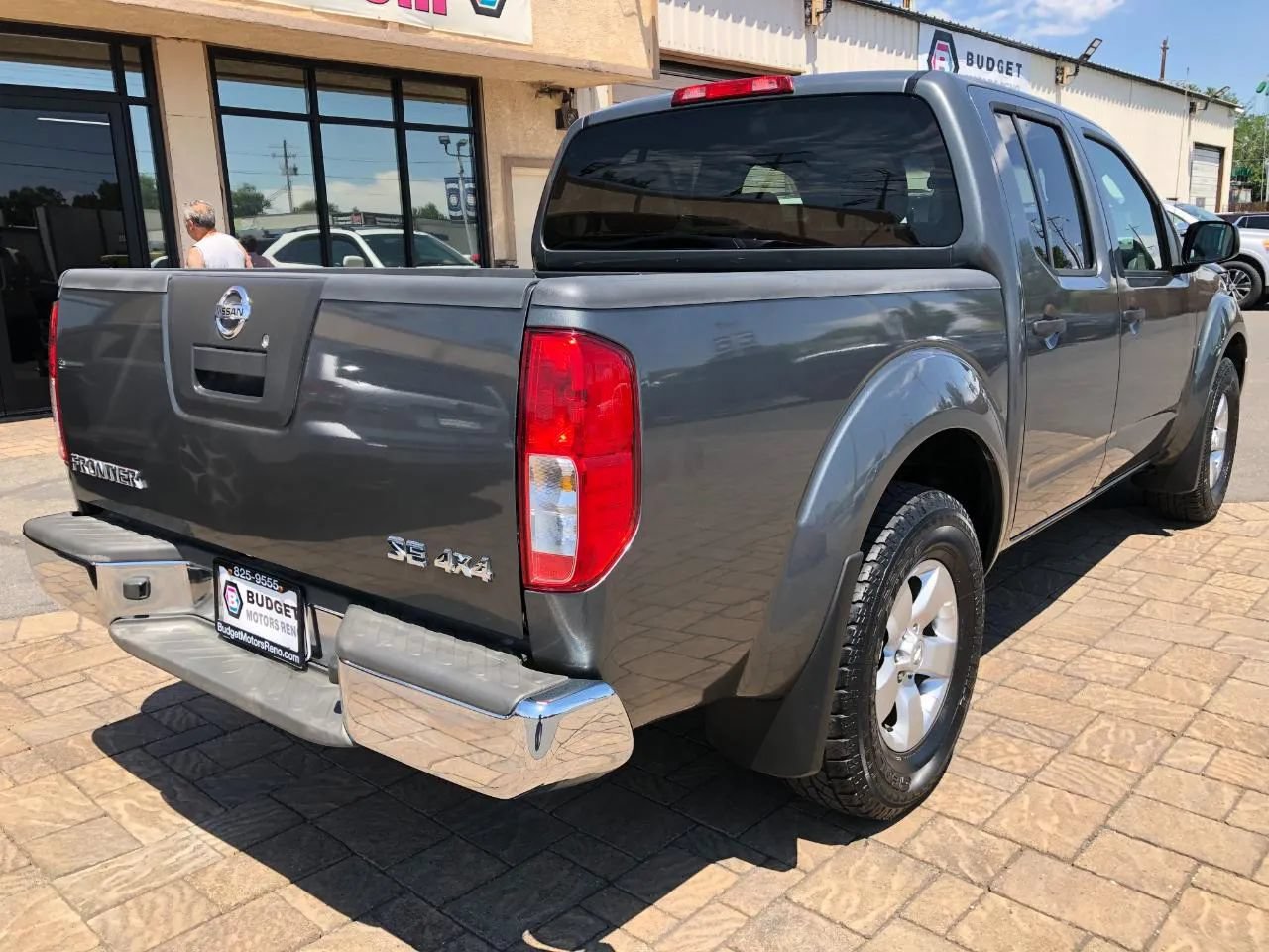 Used 2009 Nissan Frontier SE w/ SE Value Truck Pkg AWD/4WD image 2