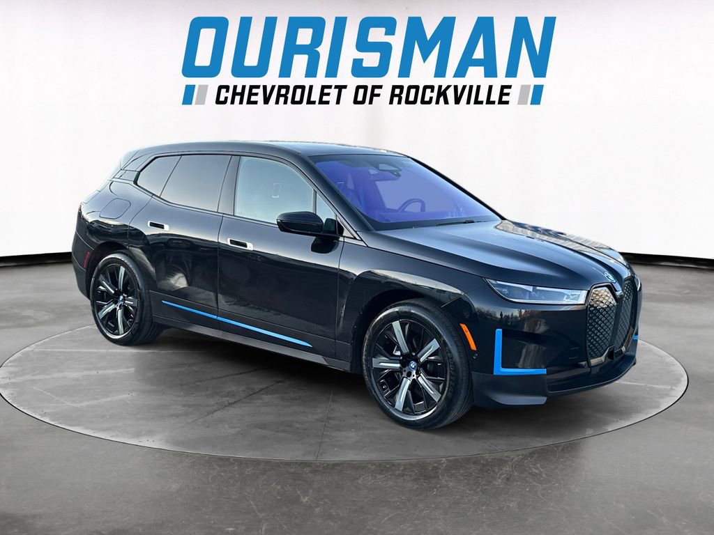 Used 2023 BMW iX xDrive50 w/ BMW I Signature Blue Package AWD/4WD image 1