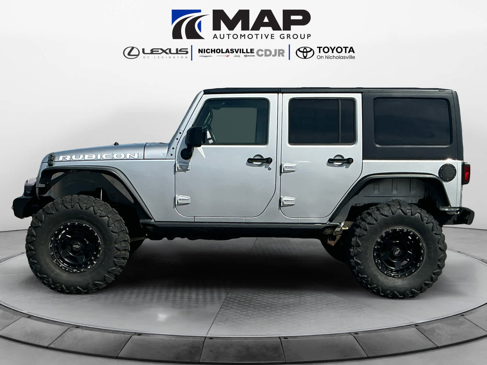 Used 2010 Jeep Wrangler Unlimited Rubicon w/ Dual Top Group image 2