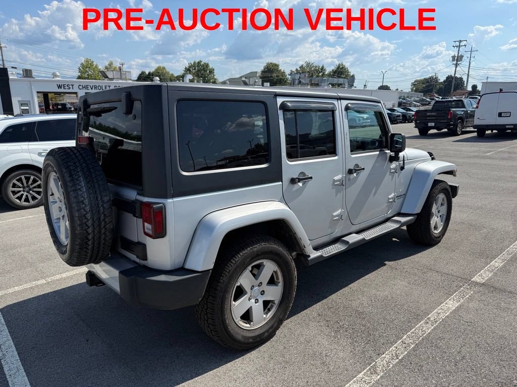 Used 2011 Jeep Wrangler Unlimited Sahara w/ Connectivity Group AWD/4WD image 3