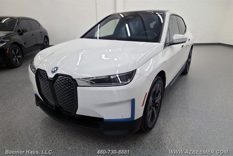 Used 2024 BMW iX xDrive50 w/ BMW I Signature Blue Package AWD/4WD image 2