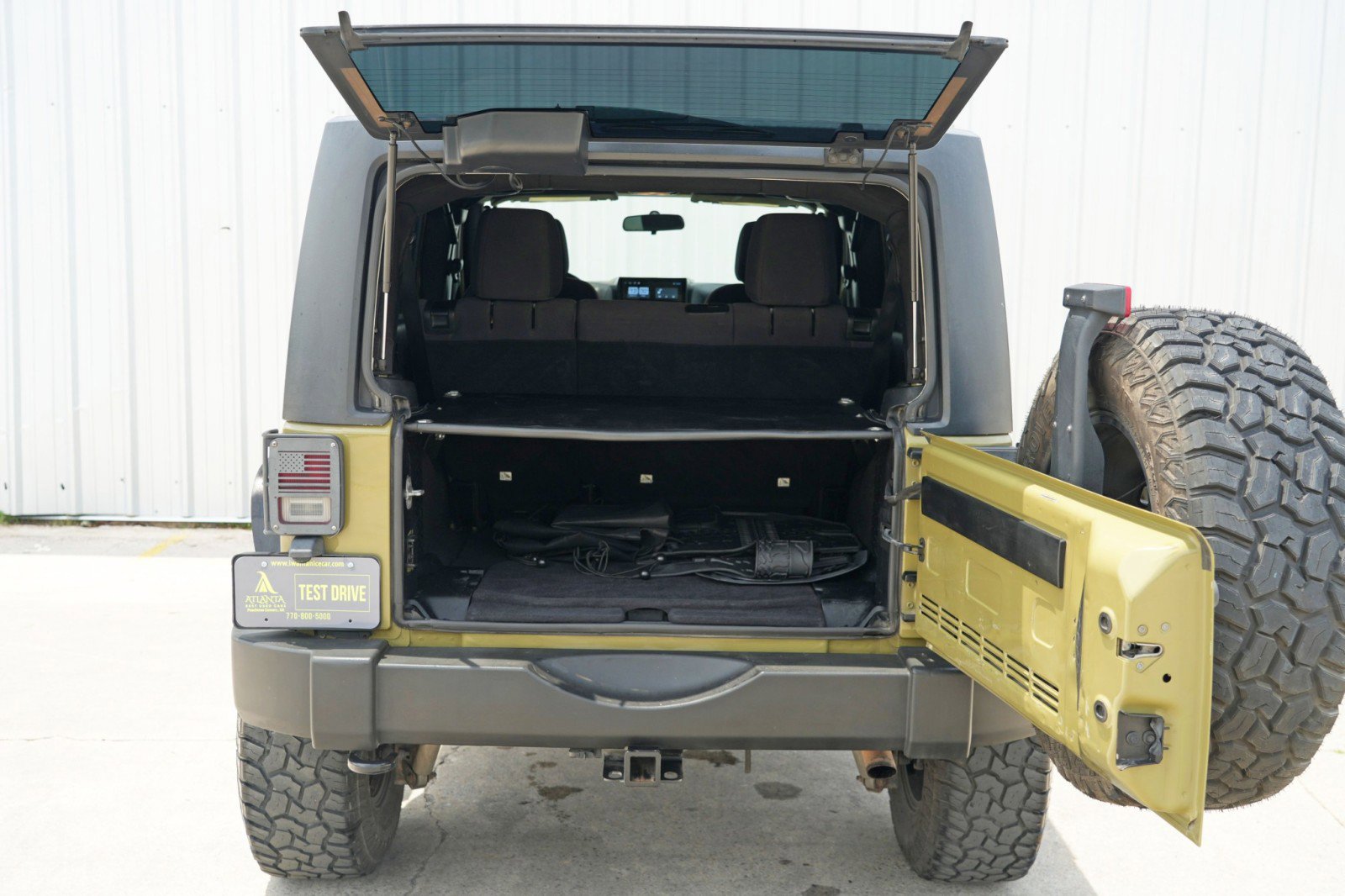 Used 2013 Jeep Wrangler Unlimited Sport w/ Mopar Black Appearance Group image 9