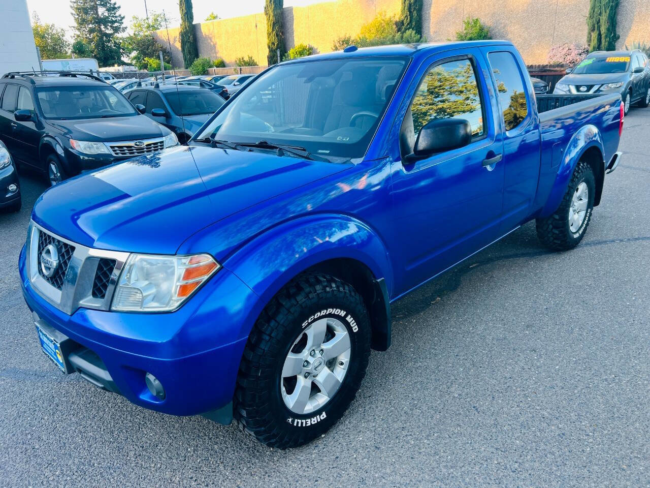 Used 2012 Nissan Frontier SV w/ SV Premium Utility Pkg AWD/4WD image 1