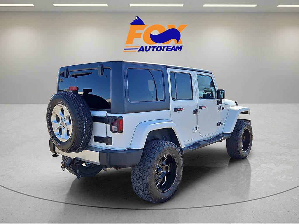 Used 2013 Jeep Wrangler Unlimited Sahara w/ Dual Top Group AWD/4WD image 4