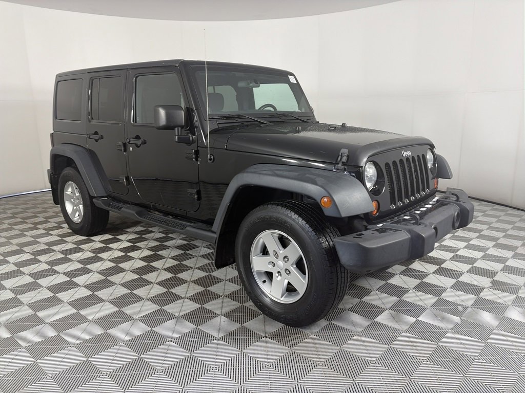 Used 2013 Jeep Wrangler Unlimited Sport w/ Dual Top Group