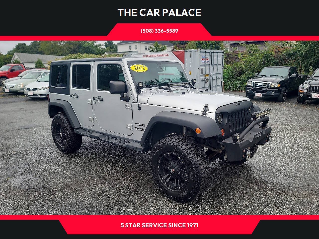 Used 2012 Jeep Wrangler Unlimited Sport w/ Dual Top Group AWD/4WD image 1